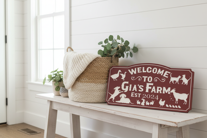 Custom farmhouse sign leaning against shiplap wall in farmhouse entryway